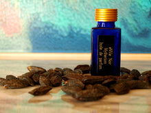 photo of 25ml sapphire blue bottle with gold lid and black engraved plate of Mytherium